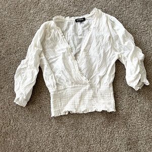 White crop top with gold pin strip detail